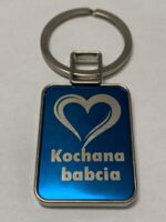 Dwustronny brelok prostokątny "KOCHANA BABCIA".